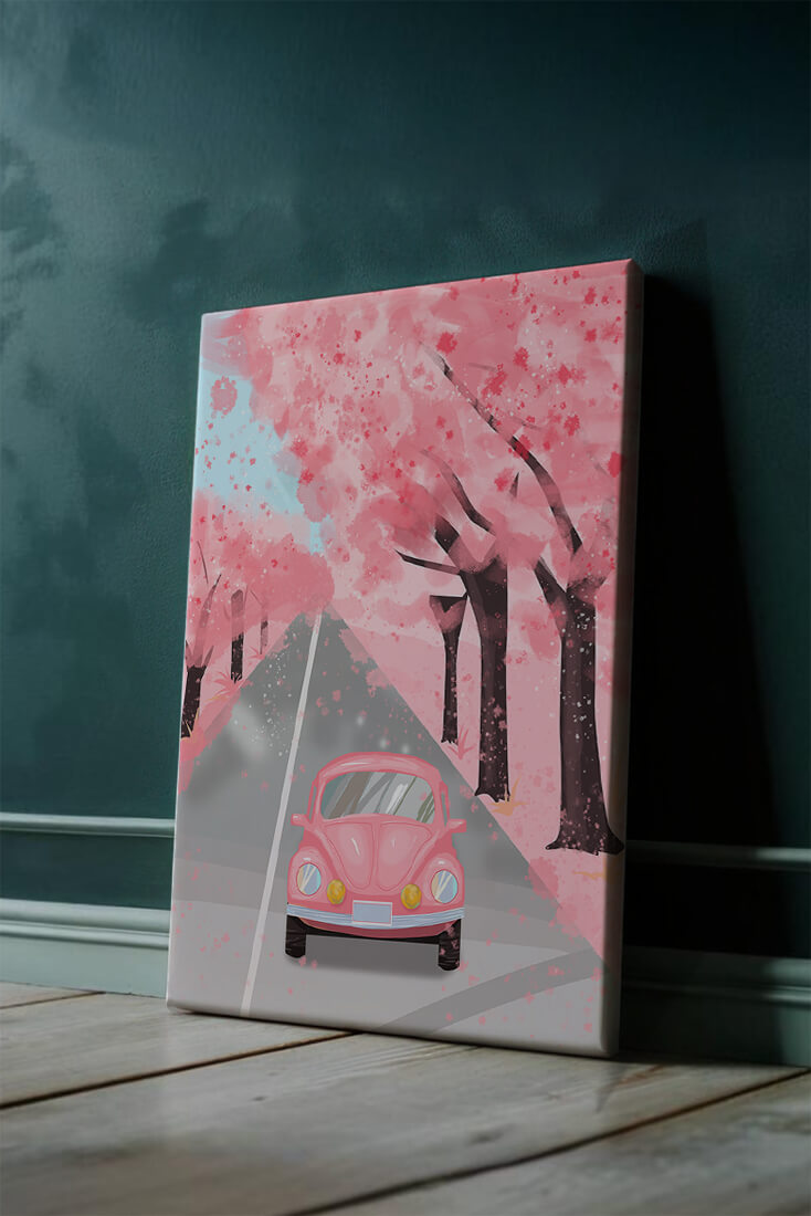 Pink vintage car on a cherry blossom road