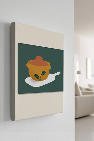 Orange Pot with Green Leaf Design on Cutting Board - Mi tienda