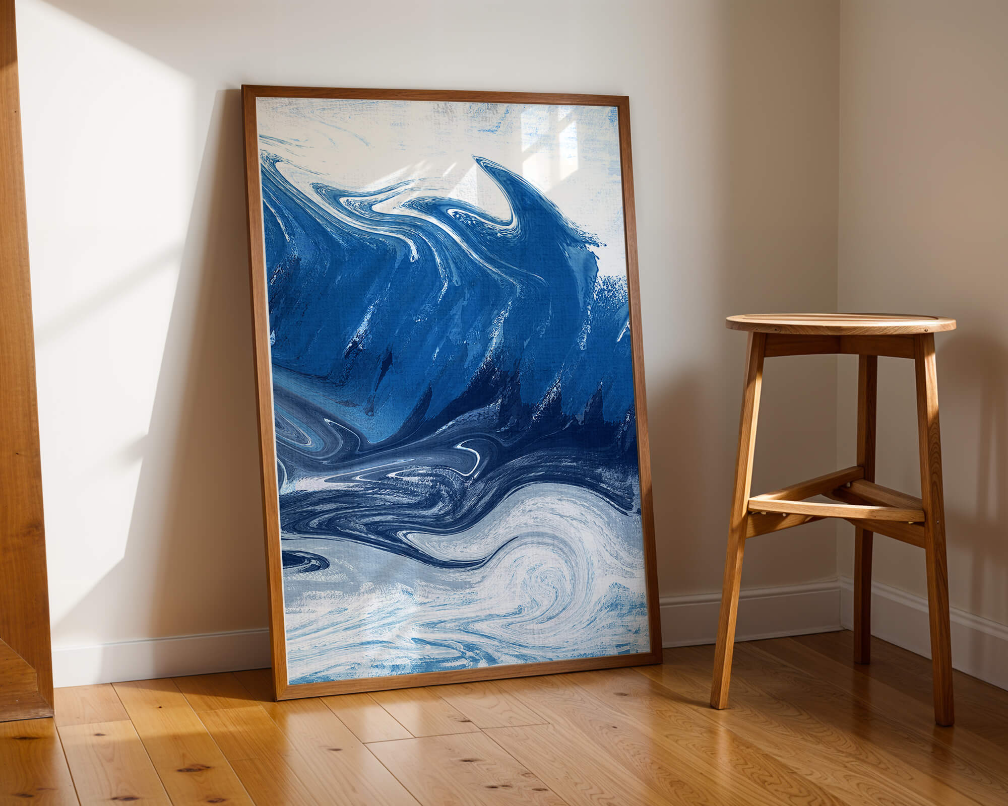 Abstract blue and white ocean wave painting with swirling patterns