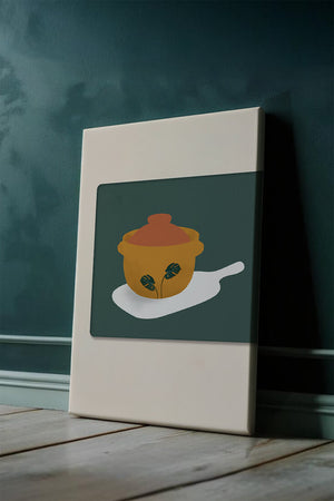 Orange Pot with Green Leaf Design on Cutting Board - Mi tienda