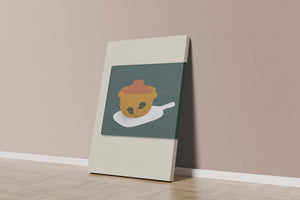 Orange Pot with Green Leaf Design on Cutting Board - Mi tienda