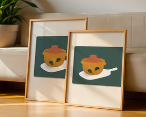 Orange Pot with Green Leaf Design on Cutting Board - Mi tienda
