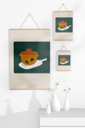 Orange Pot with Green Leaf Design on Cutting Board - Mi tienda