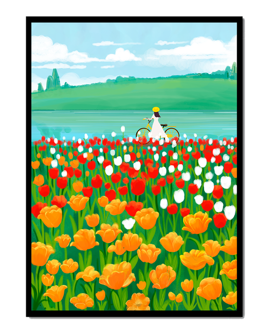 Woman with bicycle in vibrant tulip field by a lake