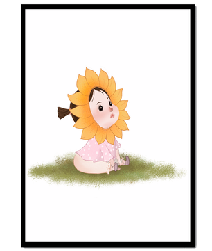 Adorable child with sunflower costume sitting on a grassy patch
