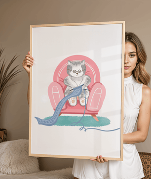 Cozy knitting cat relaxing in an armchair with a warm scarf - Mi tienda