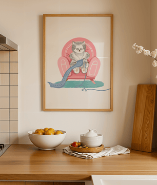 Cozy knitting cat relaxing in an armchair with a warm scarf - Mi tienda