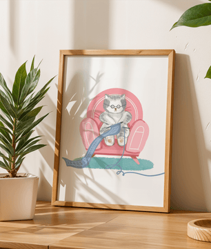 Cozy knitting cat relaxing in an armchair with a warm scarf - Mi tienda