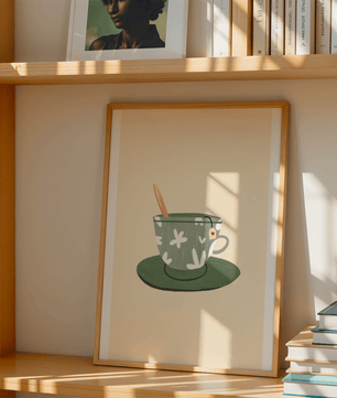 Illustration of a Green Floral Tea Cup with a Tea Bag and Spoon - Mi tienda