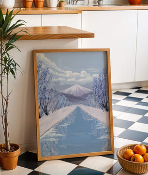 Serene winter landscape with mountain and snowy trees reflecting in water