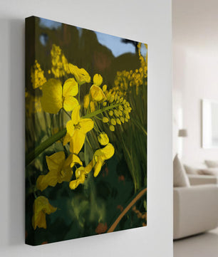 Close-up view of vibrant yellow flowers in a lush green field