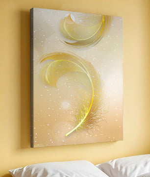 Elegant golden feather design with shimmering background