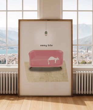 Minimalist Interior with Pink Sofa and Relaxed White Cat