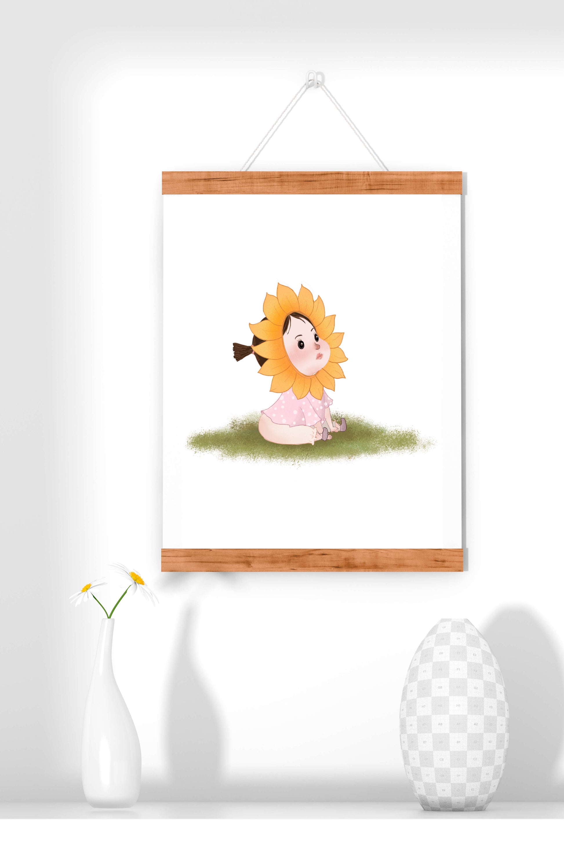Adorable child with sunflower costume sitting on a grassy patch