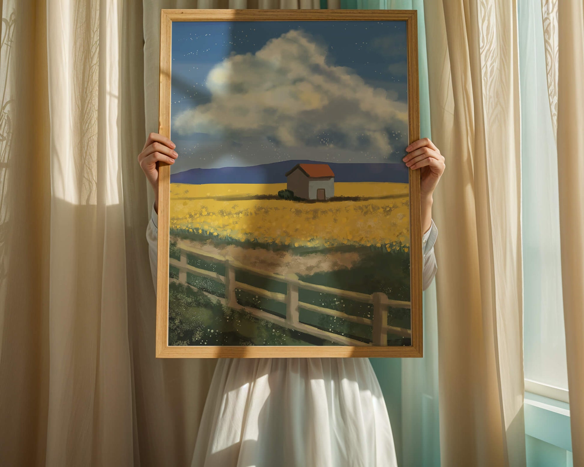 Idyllic rural scene with house and yellow field under blue sky