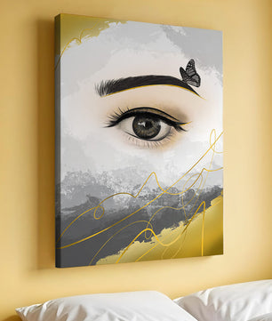 Artistic eye illustration with butterfly and abstract gold accents