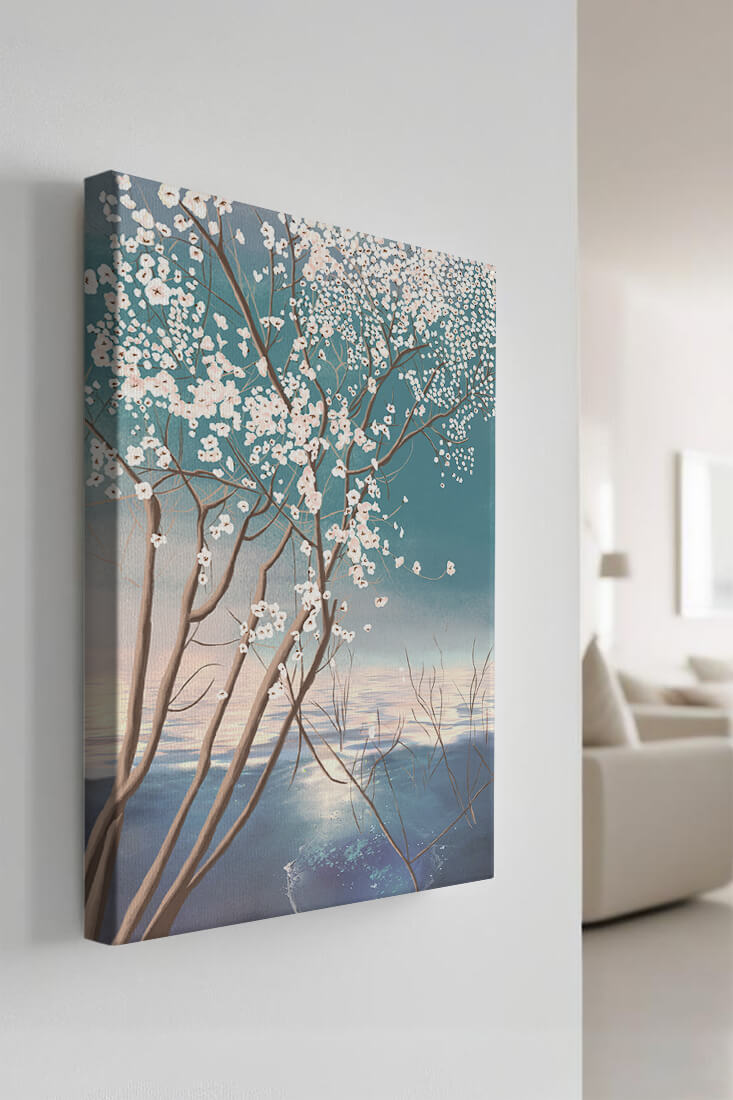 Serene landscape with blossoming tree over calm water reflection