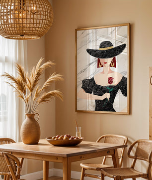 Elegant woman in wide-brimmed hat holding a rose on marble background
