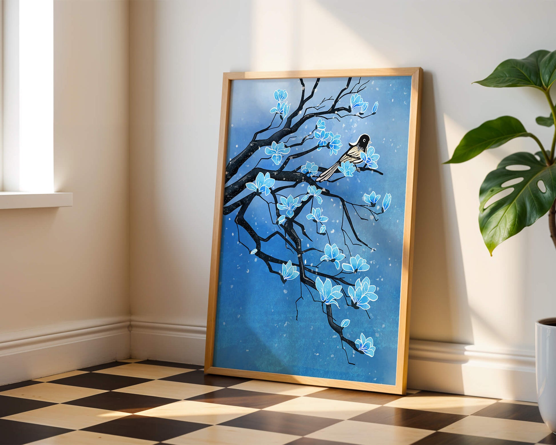 Bird on a branch with blue flowers against a snowy background