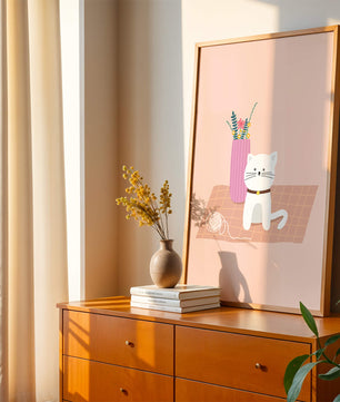 Illustration of a cute white cat with a pink vase and yarn ball on a pastel background