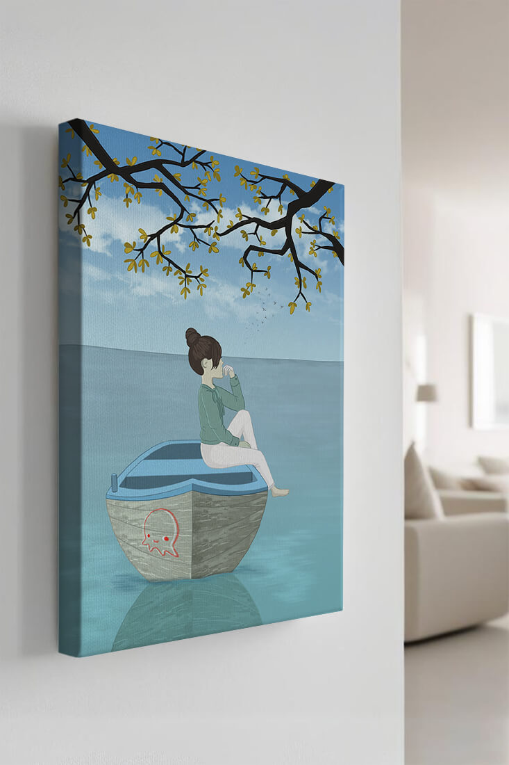 Girl relaxing on a boat under a tree by the water