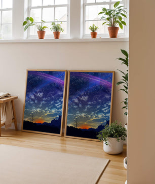 Starlit night sky with colorful sunset and silhouetted landscape