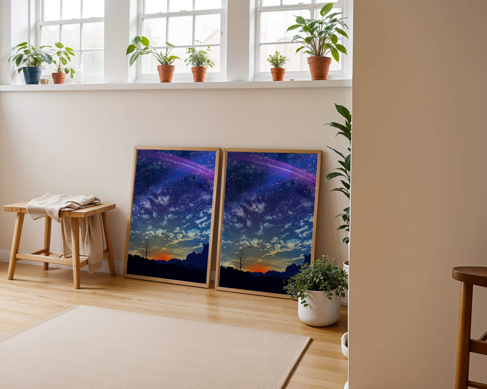 Starlit night sky with colorful sunset and silhouetted landscape