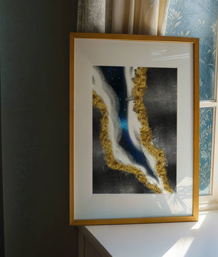 Abstract flowing design with gold, blue, and white textures