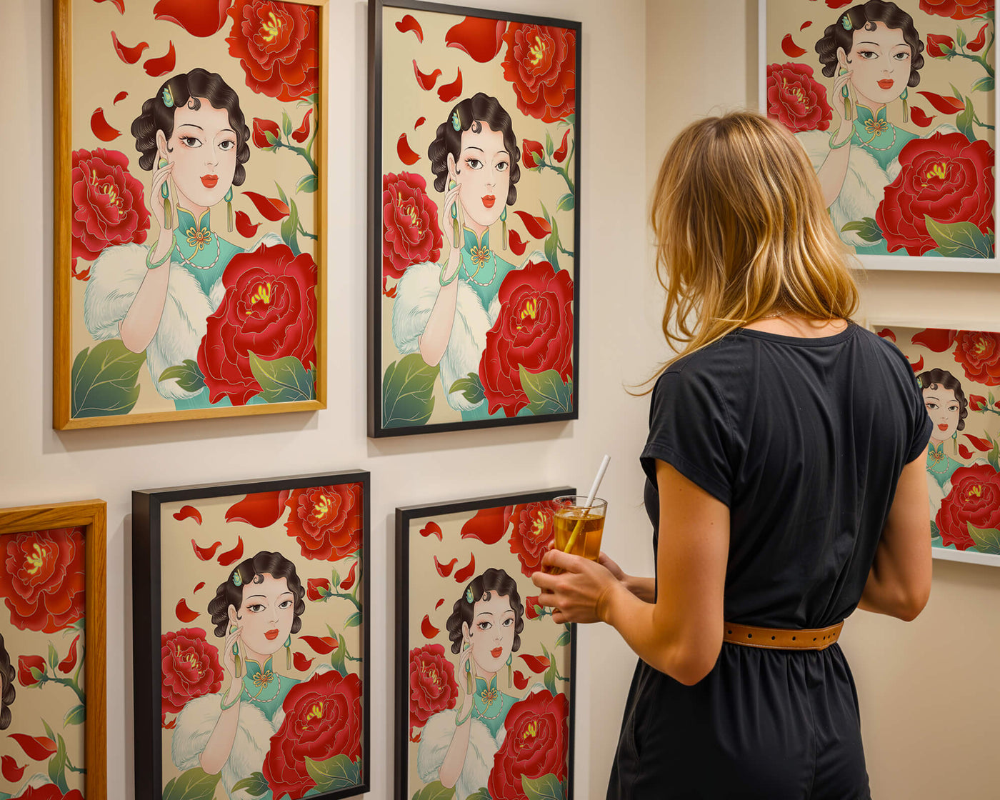 Elegant woman surrounded by vibrant red flowers and petals
