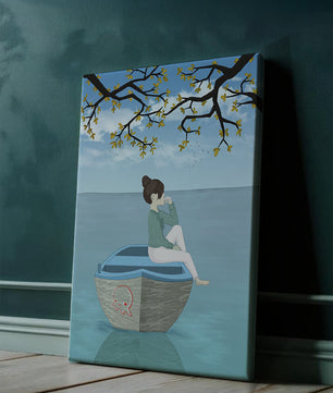 Chica relajándose en un bote bajo un árbol junto al agua