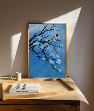 Blue Blossoms on Branch with Bird in Winter Scene