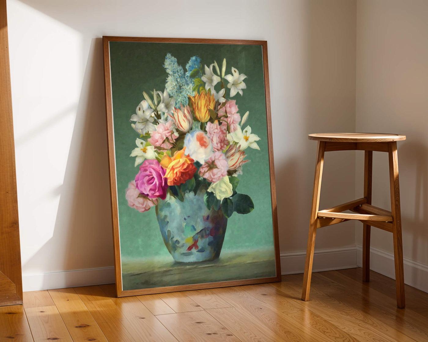 Floral arrangement in a decorative vase on a green background