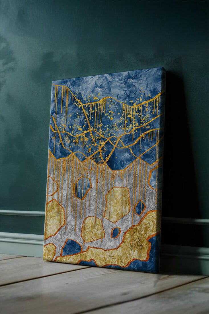 Abstract gold and blue textured art with dynamic splashes of color