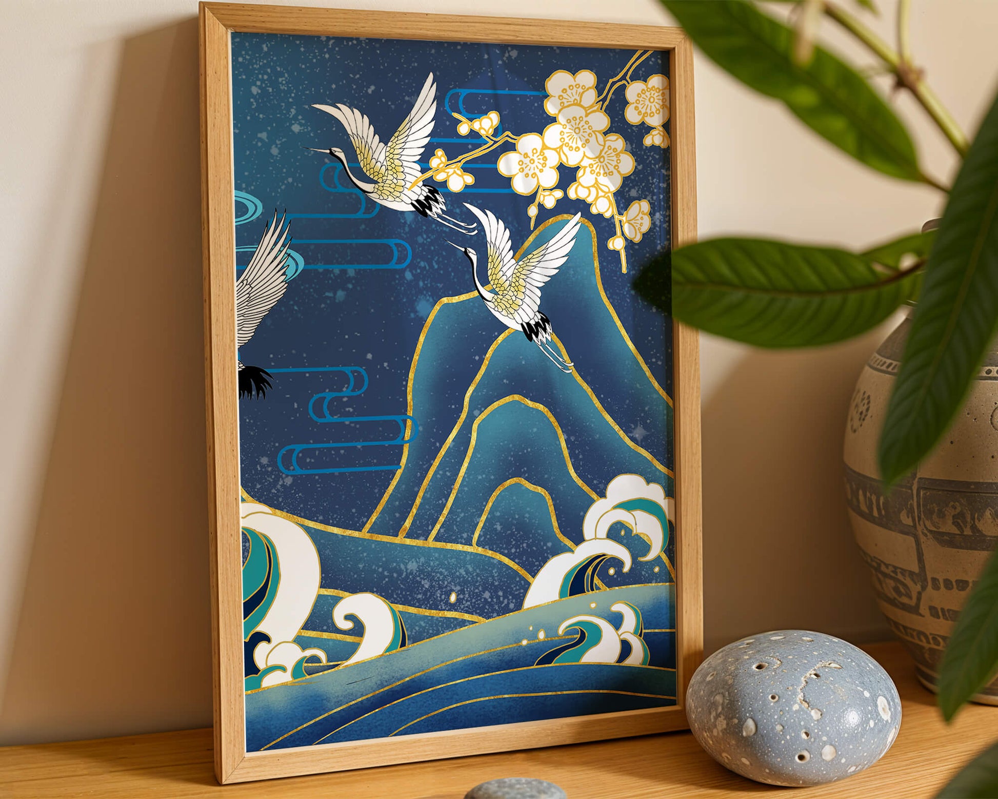 Elegant Cranes in Flight over Ocean Waves with Golden Accents and Blossoms
