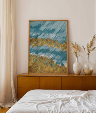 Pintura abstracta con textura dorada y fondo azul