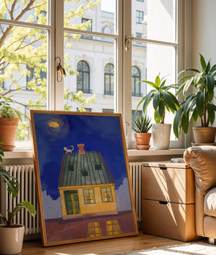 Charmantes nächtliches Haus mit einer Katze auf dem Dach unter dem Mond 
