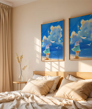 Young person gazing at a vibrant seaside sky with birds flying