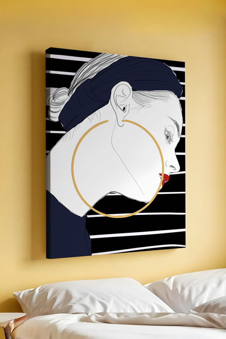 Profile of woman with hoop earrings and striped headscarf