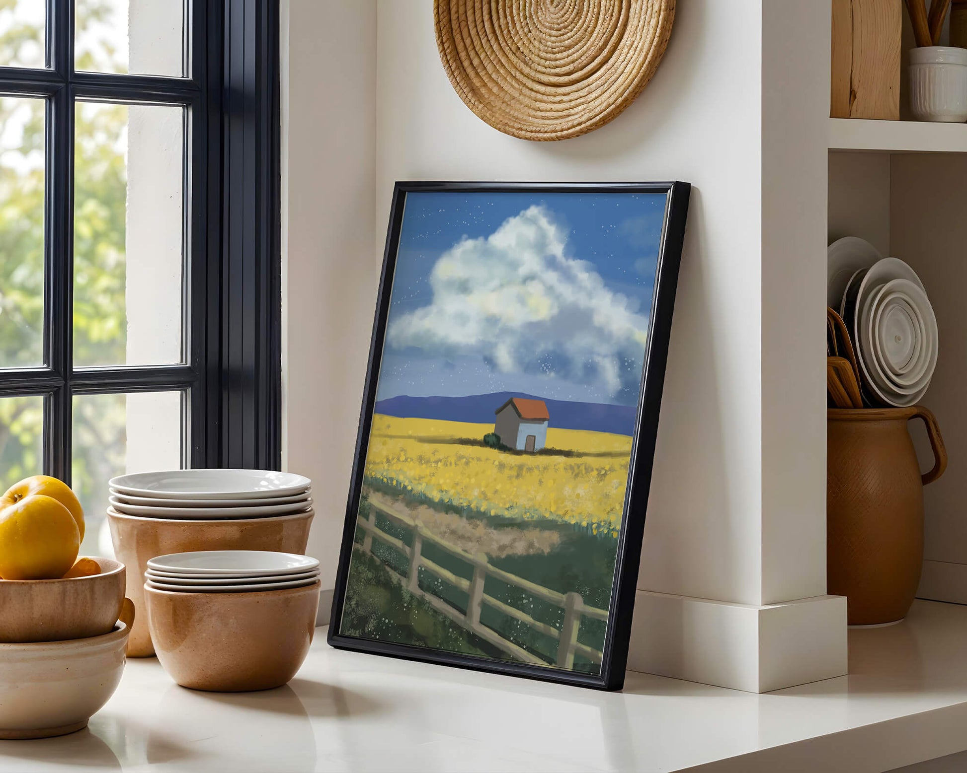 Idyllic rural scene with house and yellow field under blue sky