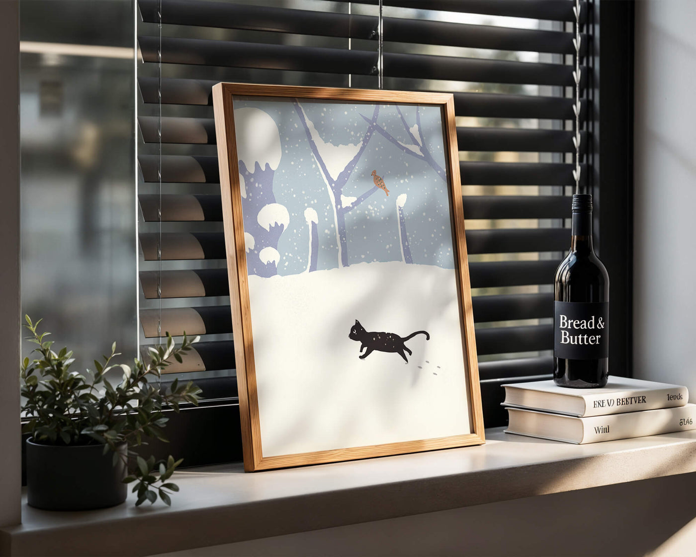 Illustrated snowy landscape with playful black cat and bird in winter scenery