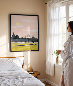 Serene landscape with mountains, village, and a girl under a pink sky