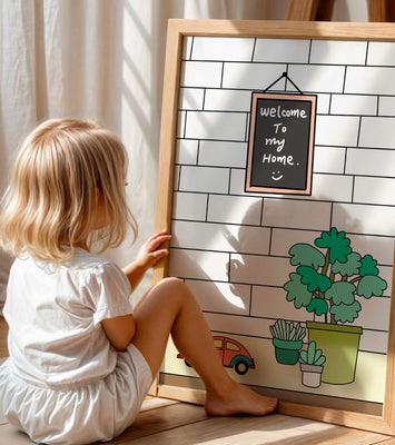 Chalkboard welcome sign with potted plants and a toy car