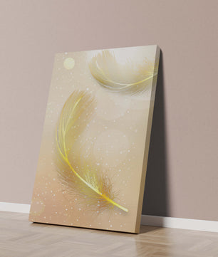 Elegant golden feathers with sparkling particles on soft background