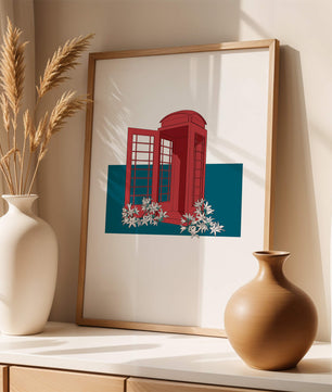 A Pink Phone Booth Surrounded by Flowers on a Teal Background