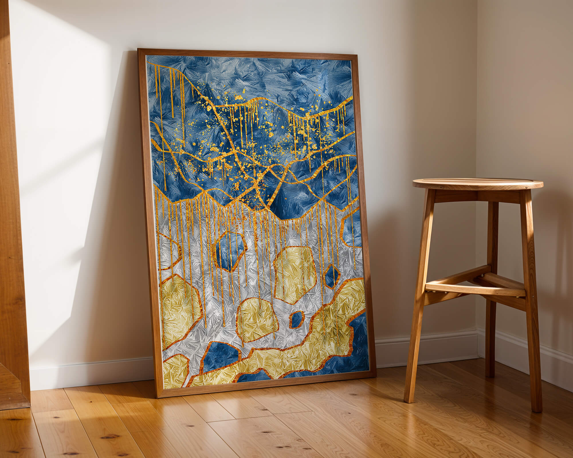 Abstract gold and blue textured art with dynamic splashes of color