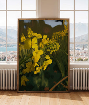 Close-up view of vibrant yellow flowers in a lush green field