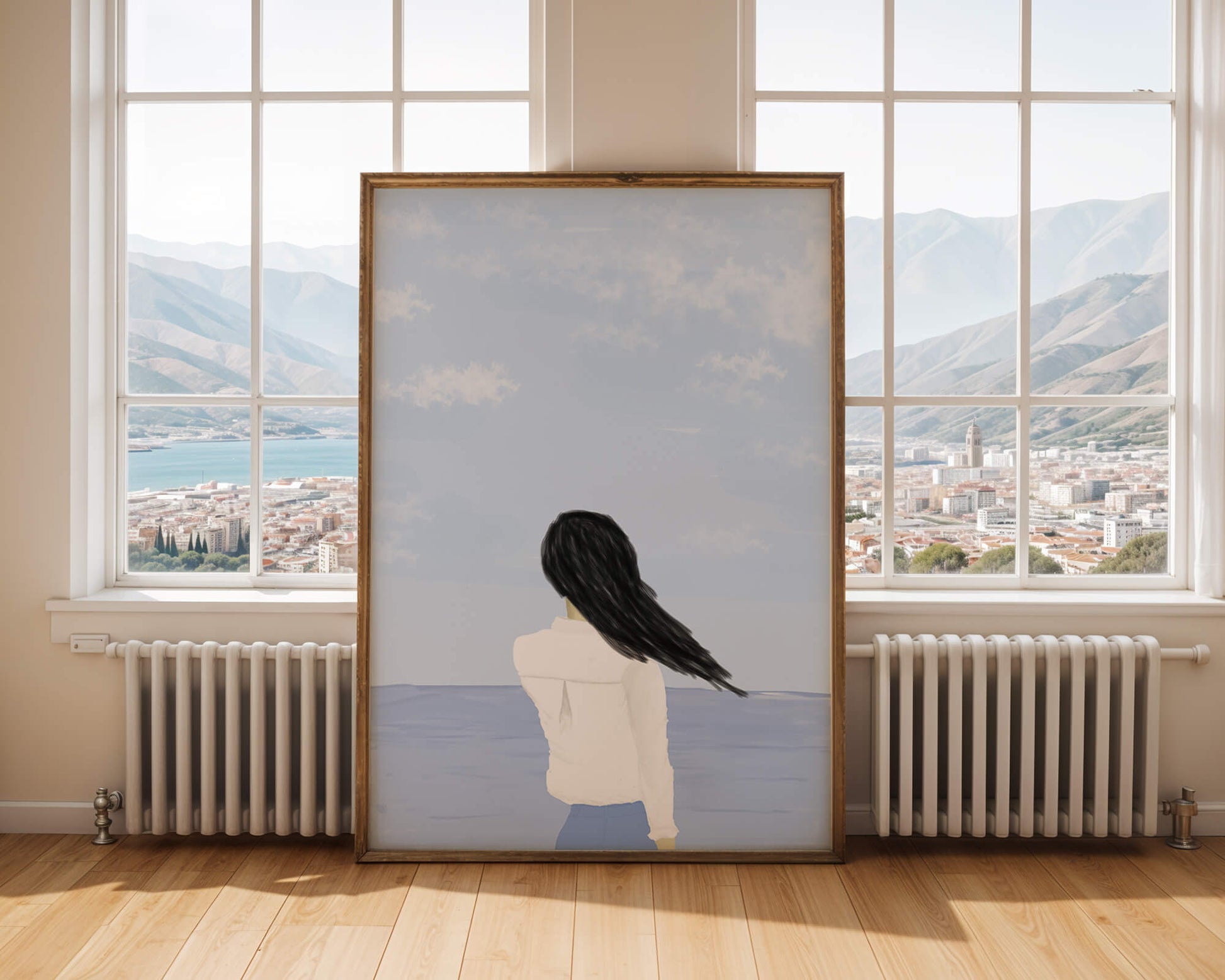 Woman gazing at the ocean with blue sky and clouds