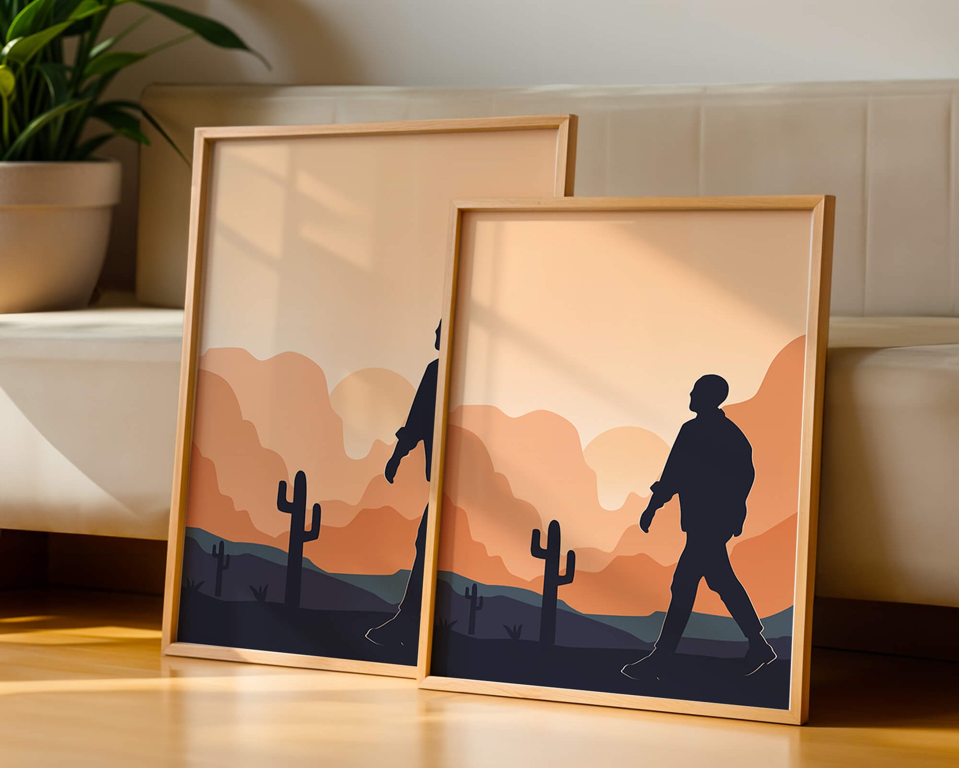 Silhouetted figure walking in desert landscape at sunset