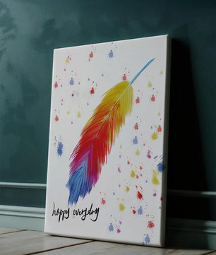 Colorful feather with inspirational message on abstract paint splatter background