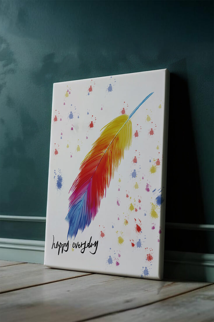 Colorful feather with inspirational message on abstract paint splatter background
